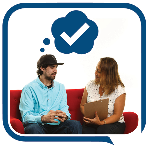 A person with a thought bubble showing a tick above them. They are being supported by someone who is showing them a document.
