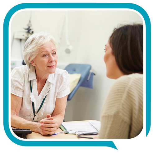 A person talking to a staff member.