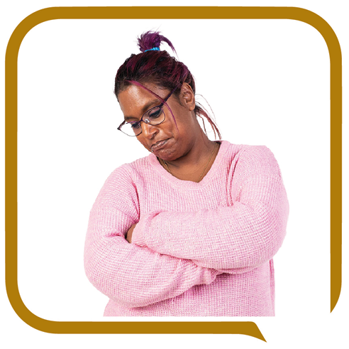 A person with their arms crossed. They look upset.